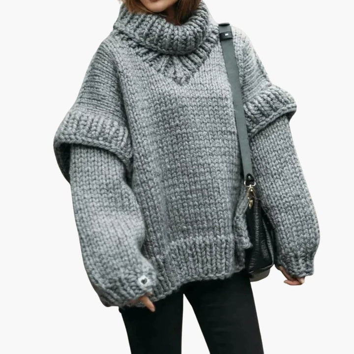 Damen Strickpullover mit hohem Kragen und geripptem Saum